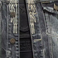 Distressed Denim Jacket with Embroidered Wings - Perfect for Casual and Fashionable Looks